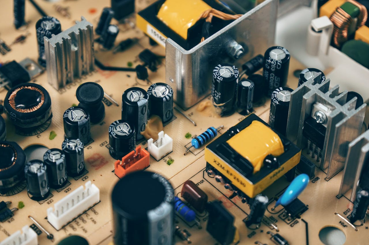 The Art of Drawing Readers In: Your attractive post title goes here Detailed shot of capacitors and resistors on a circuit board, showcasing modern technology.